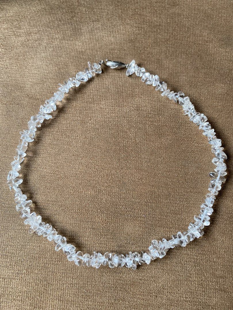 Polished natural clear quartz necklace (Category: Necklaces) located in Cebu City. Submitted by janb85 (Listing ID 1465836349, Image 2). Description: This necklace is made with natural quartz crystal chips. transparent quality. simple yet striking design. The clasp is German silver. It features a fishhook clasp (fishbone-shaped/fish-shaped clasp) and a Pacman clasp. No tarnish and very flexibly worn with gold or silver toned jewelry. The length i