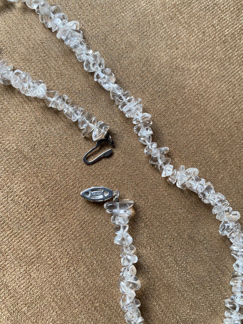 Polished natural clear quartz necklace (Category: Necklaces) located in Cebu City. Submitted by janb85 (Listing ID 1465836349, Image 3). Description: This necklace is made with natural quartz crystal chips. transparent quality. simple yet striking design. The clasp is German silver. It features a fishhook clasp (fishbone-shaped/fish-shaped clasp) and a Pacman clasp. No tarnish and very flexibly worn with gold or silver toned jewelry. The length i