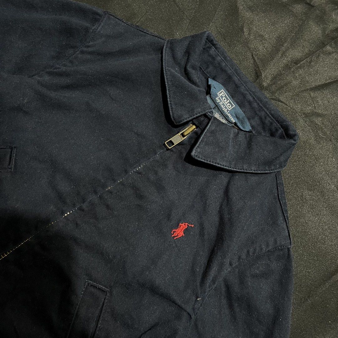Polo by Ralph Lauren Harrington Jacket (Category: Babies & Kids Fashion) located in Manila. Submitted by giormagne (Listing ID 1465876206, Image 2). Description: - Brand: Polo by Ralph Lauren - Size: 18 Months (18M) - Color: Classic Navy Blue - Material: 100% Premium Cotton (Machine Washable) - Design: Full zip front, fold-down collar, angled front pockets, and ribbed cuffs/hem - Branding: Signature red embroidered pony logo on the chest - Condit