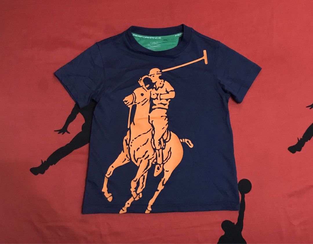 Polo Ralph Lauren Performance Tee (Category: Babies & Kids Fashion) located in Angeles City. Submitted by bashthriftstuff123 (Listing ID 1465788316, Image 1). Description: Polo Ralph Lauren Performance Tee Width 13 Length 17 Verygood condi Cut washtag 300.