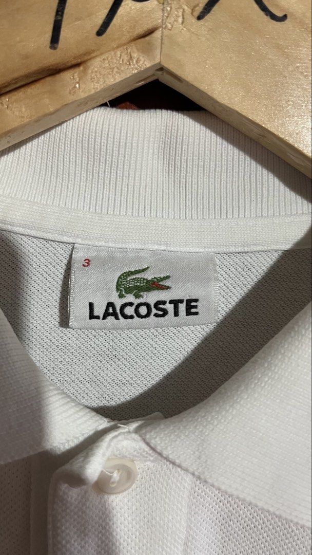 Polo Shirt Lâcoste Devanlay (Category: Tshirts & Polo Shirts ) located in Naga. Submitted by rexivan (Listing ID 1465803641, Image 3). Description: Polo Shirt Lâcoste Devanlay As new condition C.R: 10/10 Dimes: Width - 19 Length - 26 Size 3 on tag No Issue Authentic Need wash only Price + Shipping fee 📍CITY OF NAGA CEBU Unli Vouch & Video Call For Safety.