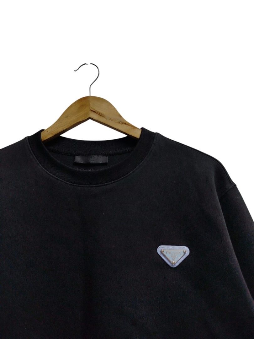 PRADA BLACK CREWNECK (Category: Coats, Jackets and Outerwear) located in Bayombong. Submitted by Gentlemans_ClosEt (Listing ID 1465781049, Image 2). Description: PRADA BLACK CREWNECK SIZE MEDIUM ON TAG DIMES: W21.5 X L26 EXCELLENT CONDITION NO ISSUES.