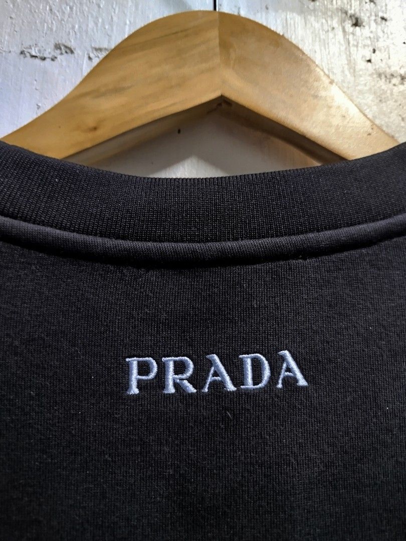 PRADA BLACK CREWNECK (Category: Coats, Jackets and Outerwear) located in Bayombong. Submitted by Gentlemans_ClosEt (Listing ID 1465781049, Image 3). Description: PRADA BLACK CREWNECK SIZE MEDIUM ON TAG DIMES: W21.5 X L26 EXCELLENT CONDITION NO ISSUES.