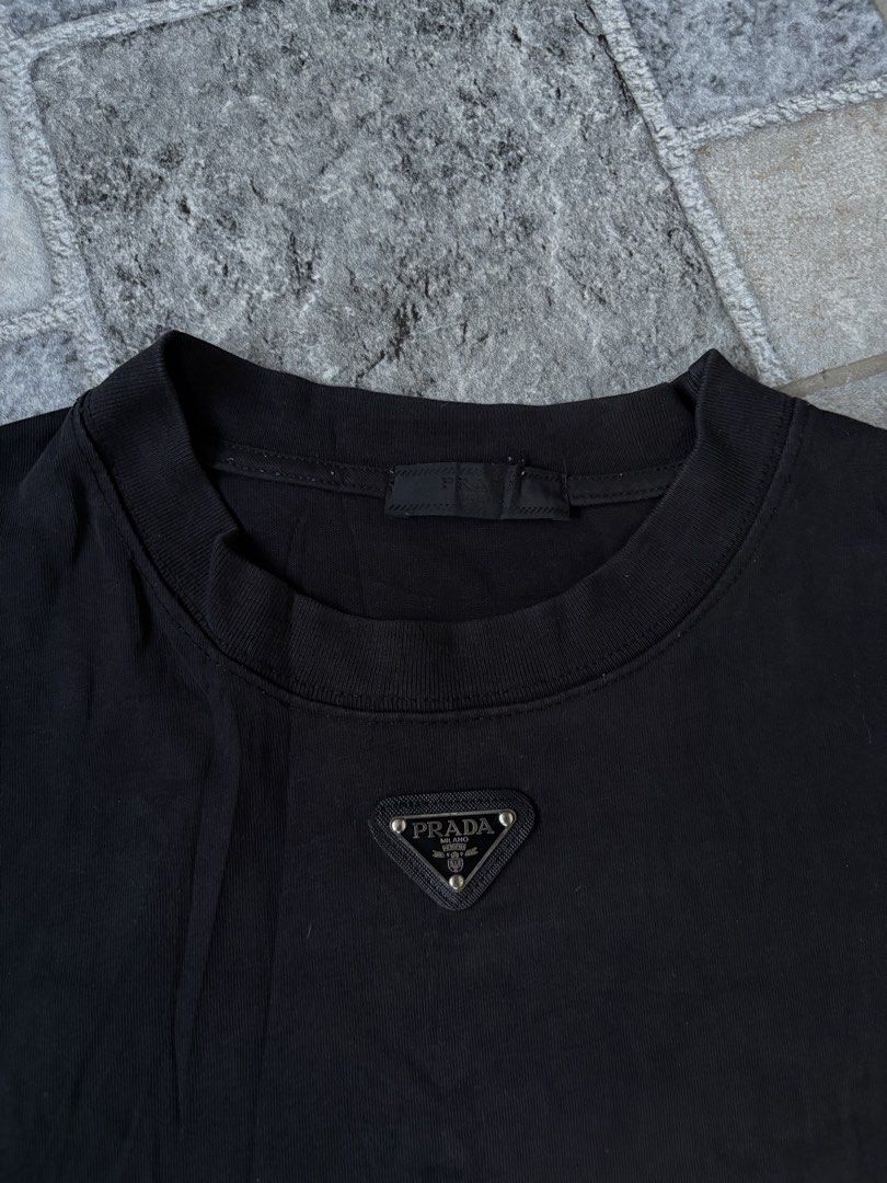 Prada Tee (Category: Tshirts & Polo Shirts ) located in Calamba. Submitted by manila.fits (Listing ID 1465834165, Image 3). Description: Prada Tee Large Boxy Fit Width 23 Length 25 Good as new No issue.