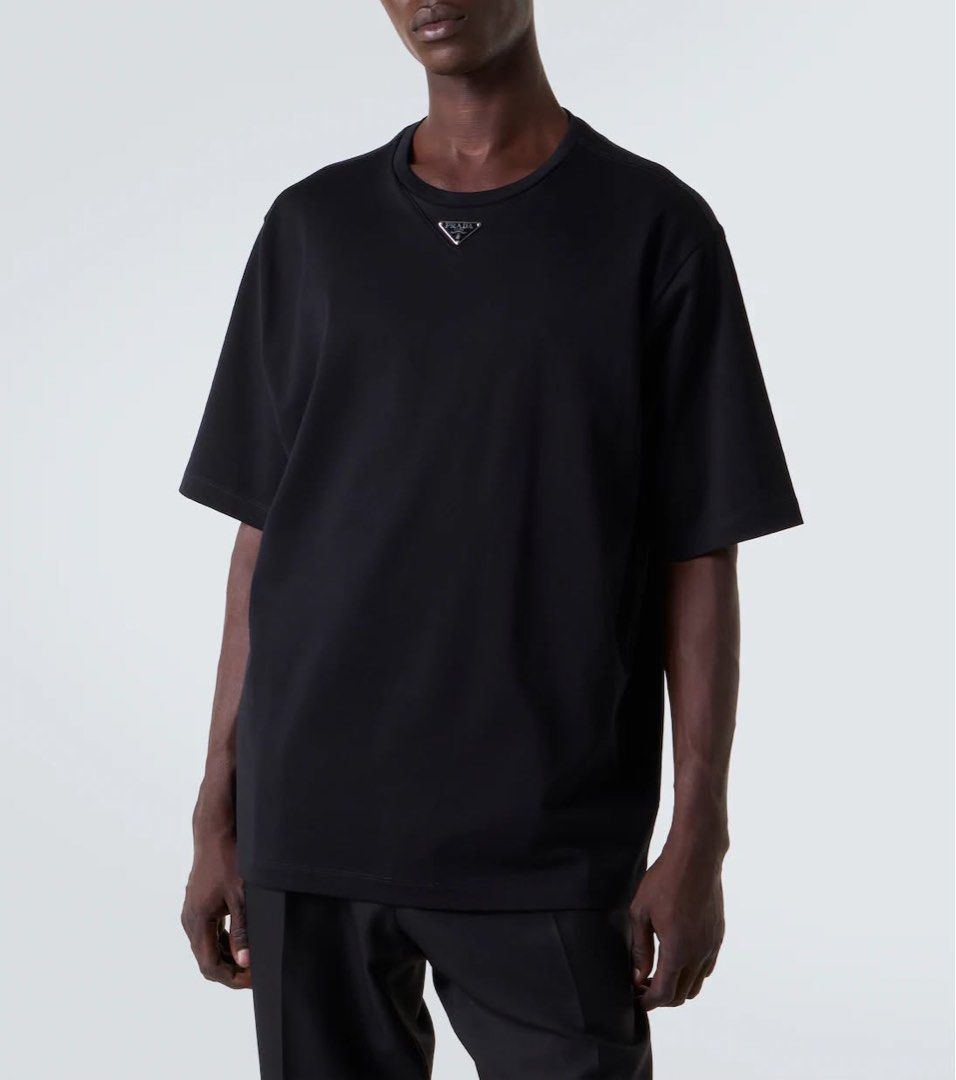 Prada Tee (Category: Tshirts & Polo Shirts ) located in Manila. Submitted by nofits.garments (Listing ID 1465836813, Image 1). Description: Prada Tee Boxy fit Large Width 23 Length 25 Good as new No issue.
