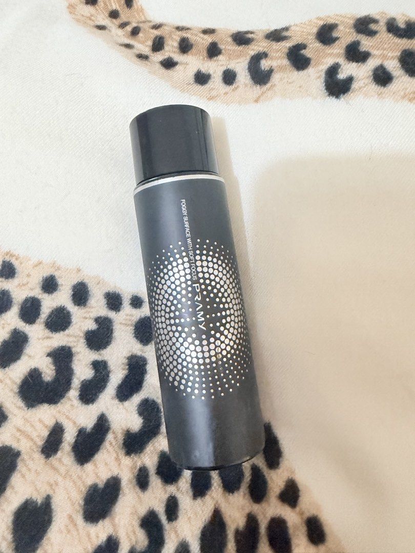 PRAMY Foggy Surface With Soft Focus Makeup Setting Spray (Category: Makeup) located in Manila. Submitted by mengxir20193848 (Listing ID 1465880369, Image 1). Description: - Authentic PRAMY Setting Spray - Size: 100ml (Full Size) - Finish: Soft-focus matte, all-day long-lasting hold - Packaging: Sleek black cylinder bottle with silver dot design and black cap - Condition: Brand new and authentic - Perfect for daily makeup looks that need to stay f