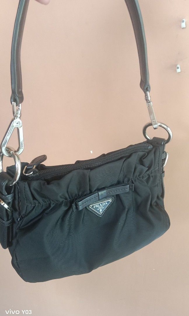 Preloved authentic Prada kili2x bag lampo zip (Category: Luxury Bags & Wallets) located in Cabuyao City. Submitted by selections888 (Listing ID 1465843362, Image 1). Description: authentic preloved from Japan supplier color black lampo underzip with Made and code lampo underzip expect minimal sign of use as preloved still in good condition very elegant and eye catching.