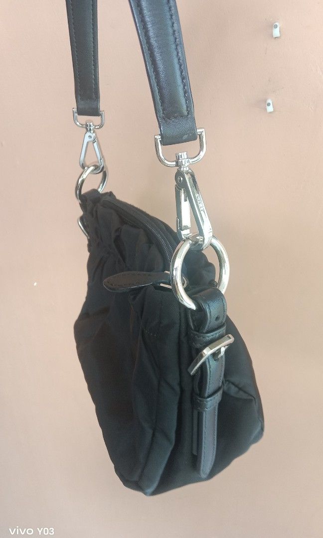 Preloved authentic Prada kili2x bag lampo zip (Category: Luxury Bags & Wallets) located in Cabuyao City. Submitted by selections888 (Listing ID 1465843362, Image 2). Description: authentic preloved from Japan supplier color black lampo underzip with Made and code lampo underzip expect minimal sign of use as preloved still in good condition very elegant and eye catching.