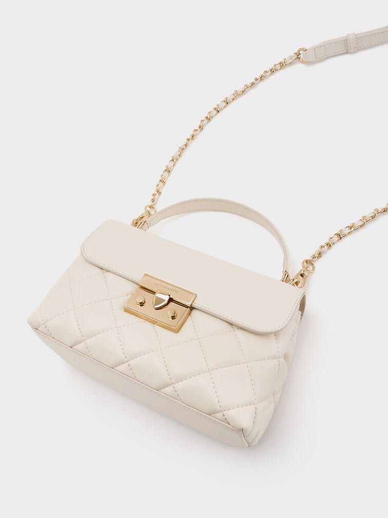 Pre-loved Charles & Keith Bag Alva Quilted (Category: Luxury Bags & Wallets) located in Cebu City. Submitted by hhanybae (Listing ID 1465936013, Image 2). Description: Pre-loved Original with receipt, paper bag, dust bag, and paper cards. Rfs: no longer using Original price: 4,399 Location: Tisa, Cebu City PM for actual pics ‼️flaws: small lipstick stain inside the pocket of the bag.