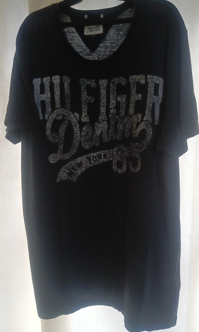 PRE-LOVED Hilfiger Denim Graphic Spell-Out Tee (Category: Tshirts & Polo Shirts ) located in Antipolo. Submitted by foncimigz (Listing ID 1465878921, Image 1). Description: AUTHENTIC] Hilfiger Denim Graphic Spell-Out Tee Description: Authentic pre-loved black graphic t-shirt from Hilfiger Denim Brand: Hilfiger Denim (Tommy Hilfiger) Size: L (Large) Color: Black Style: Streetwear / Casual / Y2K Retro Condition: Good pre-loved condition. Print is i