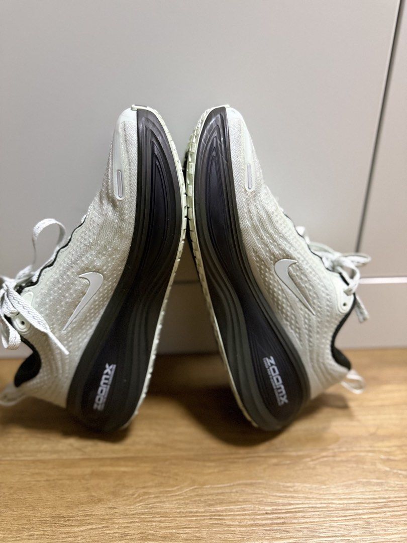 Preloved Nike Vomero Plus in light green (Category: Sneakers) located in Pasig City. Submitted by akis.onlineshop (Listing ID 1465788169, Image 2). Description: No box, kept on acrylic boxes | 23cm | in good condition.