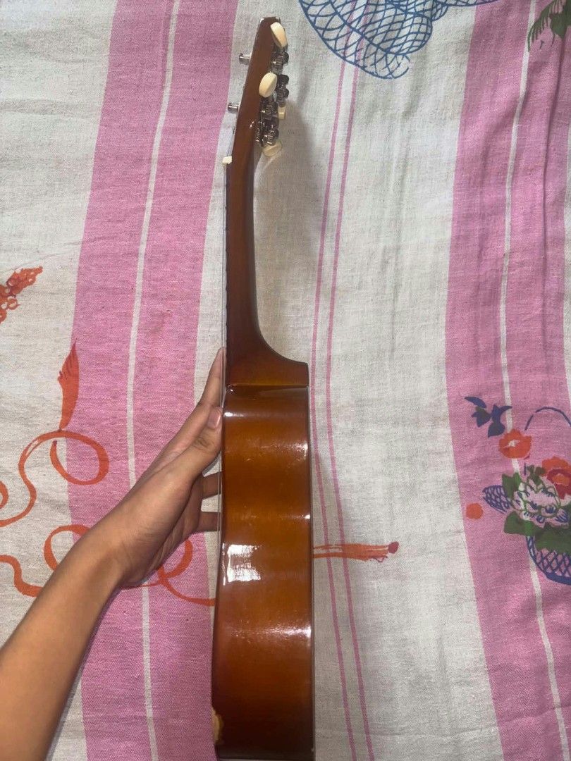 Premiere Ukulele Wooden Instrument (Category: Musical Instruments) located in Trece Martires City. Submitted by unshelved_ph (Listing ID 1465857874, Image 2). Description: Ukulele for Sale‼️ 📌Premiere Ukulele Freebies: ✅Ukulele Bag ✅2 Guitar Picks 👉Barely used (ginamit lang for a school performance) 👉In good condition 👉Scratches do not affect the instrument's performance - DM for more info - CO through DM. If shipping, it will be through J&T 