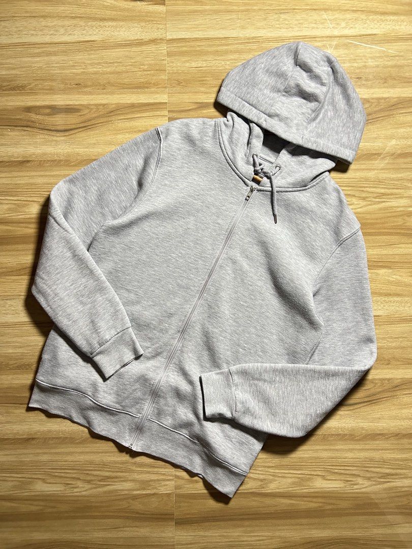 Primark Grey Zip-Up Hoodie Size L (Category: Coats, Jackets and Outerwear) located in Tarlac. Submitted by selfmade_legacy (Listing ID 1465894139, Image 1). Description: - Brand: Primark - Size: Large - Color: Classic Grey - Material: 50% cotton blend with soft fleece interior lining - Features: Front metal zipper closure, adjustable hood drawstrings with metal aglets, ribbed cuffs and hem - Condition: Great everyday basic hoodie for casual wear 