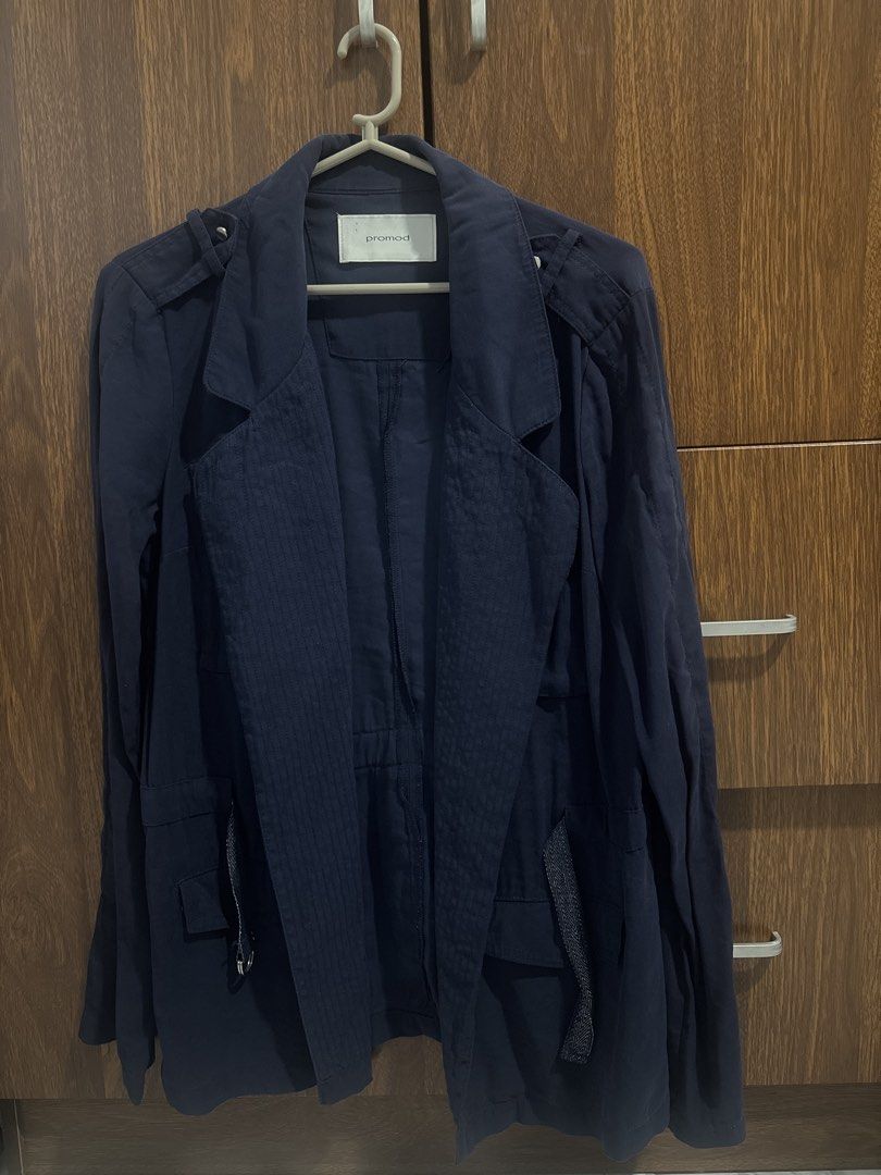 Promod Navy Blue Lightweight Jacket (Category: Coats, Jackets and Outerwear) located in Paranaque City. Submitted by rosexxxd (Listing ID 1465903771, Image 1). Description: - Brand: Promod - Color: Navy blue - Material: Soft, lightweight fabric - Design: Open front with lapels and shoulder epaulets - Details: Front pockets with textured ribbon trim and adjustable inner drawstring waist - Condition: Clean overall, great for layering.