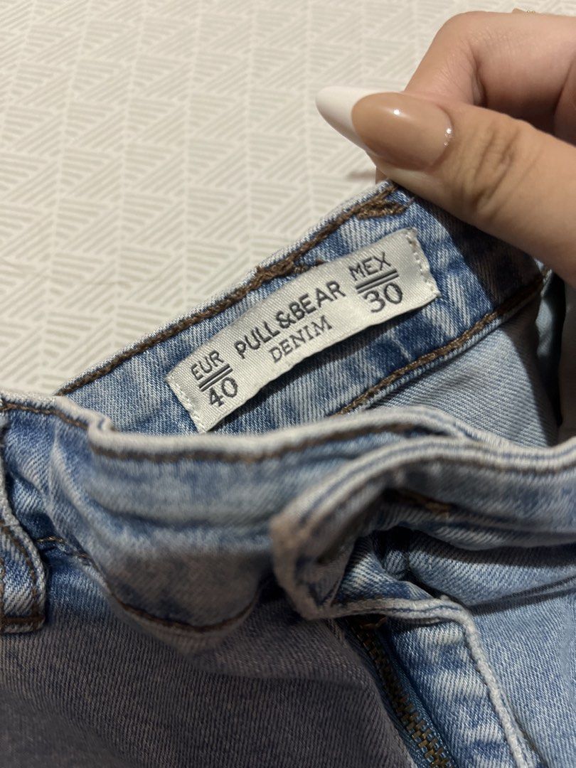 Pull & Bear Denim Shorts EUR 40 (Category: Shorts) located in Manila. Submitted by kaceylgt (Listing ID 1465925849, Image 3). Description: - Brand: Pull & Bear - Size: EUR 40 / MEX 30 - Wash: Light wash denim - Fit: High-waisted with cuffed hems - Details: Button closure, functional four-pocket design - Condition: Great casual summer staple, easy to style with tees and tanks.