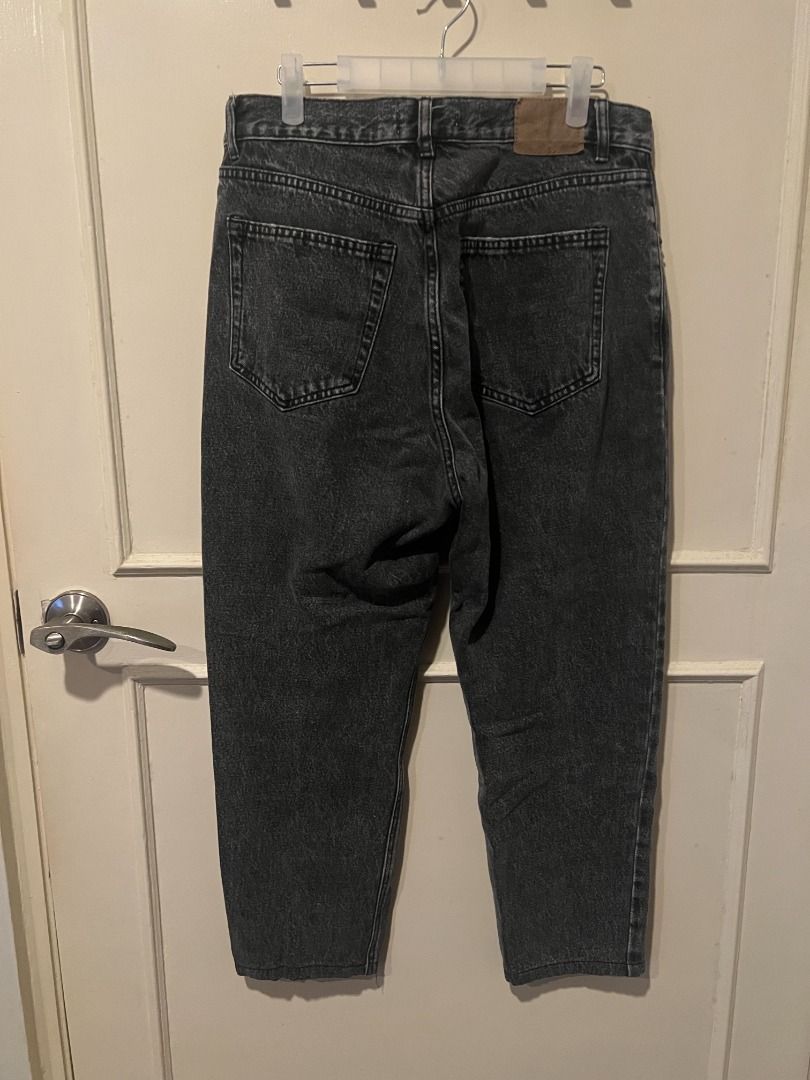 Pull&Bear Dark Grey Acid Wash High Waisted Jeans [p1] (Category: Jeans) located in Pasig City. Submitted by awesamfinds (Listing ID 1465833512, Image 3). Description: - Brand: Pull&Bear - Style: High waisted mom jeans with tapered legs - Wash: Dark grey acid wash - Details: Button fly, belt loops, front and back pockets, brown leather brand patch - Condition: Clean, excellent, no stains or damage - Perfect staple piece for casual everyday outfits