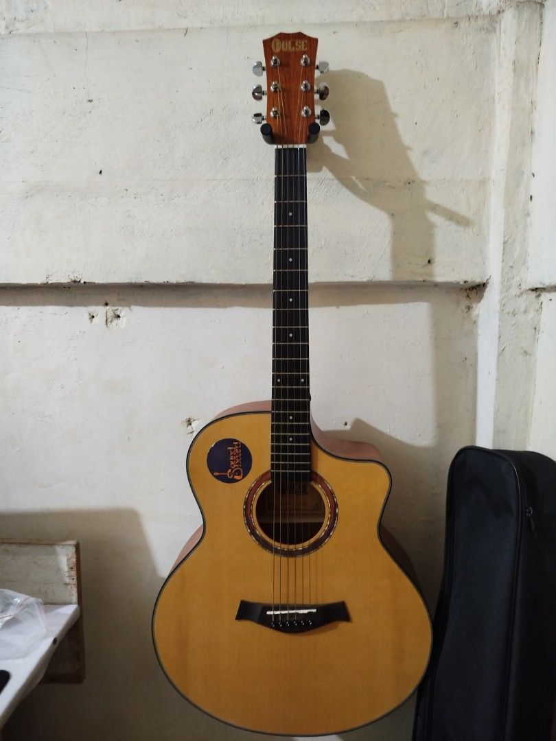 Pulse Guitar Bnew used (Category: Musical Instruments) located in Manila. Submitted by johngabriell (Listing ID 1465862094, Image 2). Description: Solid Spruce top Mahogany Side and Back W/trussrod W/pickup inclusions in the last picture Good as new One week old.