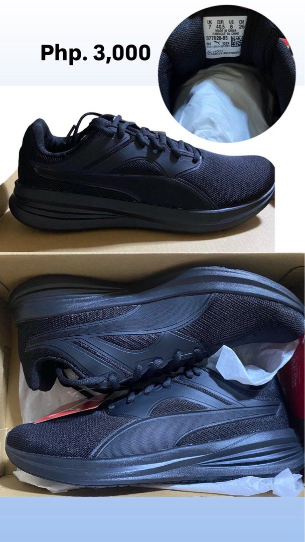 Puma All-Black Running Shoes (Category: Sneakers) located in Quezon City. Submitted by flrsgela (Listing ID 1465895256, Image 1). Description: - Brand: Puma - Color: All-black - Condition: Brand new, never worn (with original box, paper stuffing, and tags attached) - Size: UK 7 / EUR 40.5 / US 8 / CM 26 - Design: Clean mesh upper with solid overlays and cushioned foam midsole - Best for: Daily runs, walking, or casual wear.