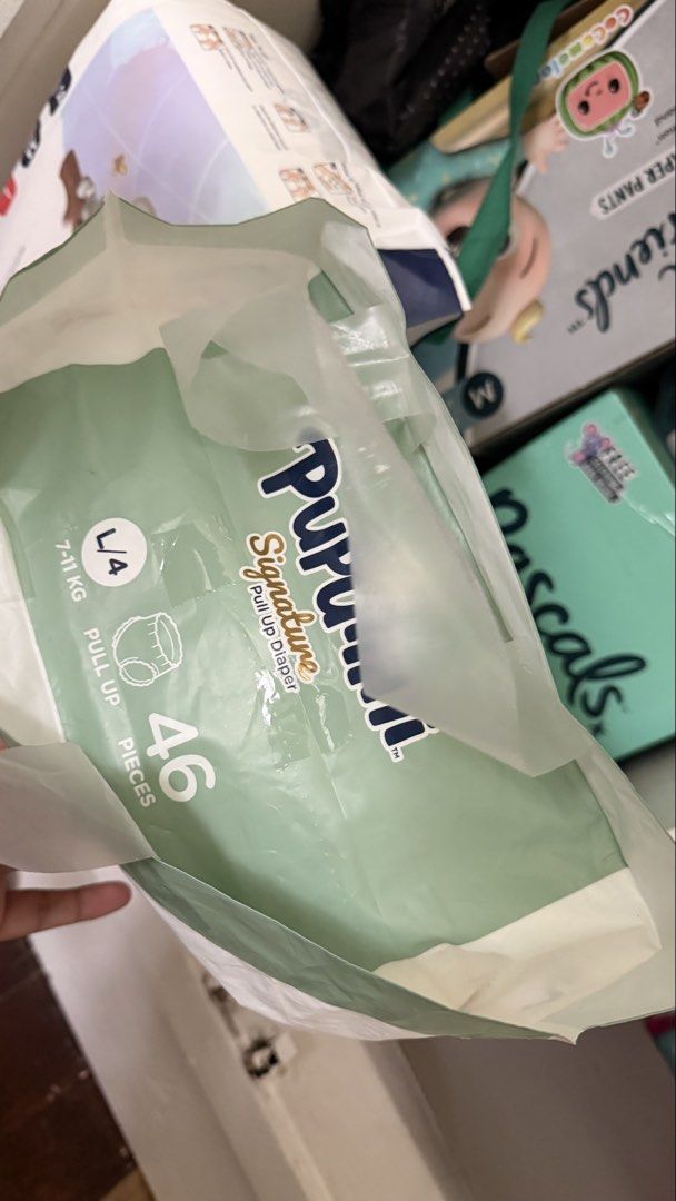 Pupuliini Diaper - Large (Category: Diapers & Baby Wipes) located in Quezon City. Submitted by preciouslira (Listing ID 1465789704, Image 2). Description: RFS- Never been used nakalakihan na stock lang for a month Brand/Model: Pupuliini Signature Pull-Up Diapers - Size: L / Size 4 (Suitable for 7-11kg) - Quantity: 46 pieces per pack - Skin Care: Infused with moisturizing avocado extract; hypoallergenic - Comfort: 360-degree elastic waistband with