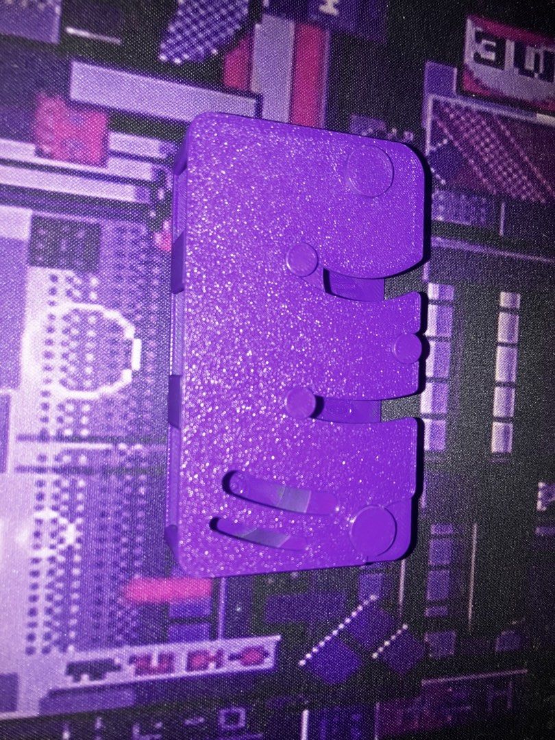 Purple 3D Printed Counter Coin Holder (Category: Wallets & Card holders) located in Manila. Submitted by yilviolet (Listing ID 1465779359, Image 2). Description: - Color: Vibrant purple with a textured exterior finish - Organized storage: Dedicated slots for 1s, 5s, 10s, and 20s damage counters and coins - Secure transport: Includes a matching slide-on lid to keep tokens safe - Portable: Compact size easily fits inside standard deck boxes or bags