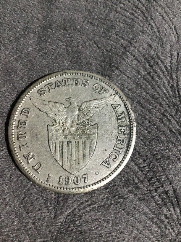 Quality 1907 one peso Uspi antique silver (Category: Vintage Collectibles) located in Baguio. Submitted by agozun61 (Listing ID 1465906193, Image 2). Description: 1907 USPI one peso silver vintage coin.good condition..