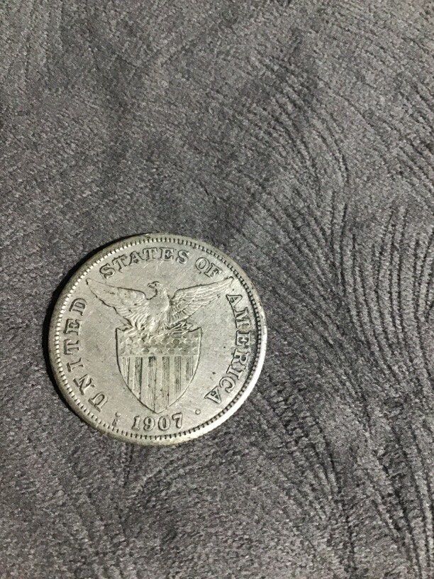 Quality 1907 one peso Uspi antique silver (Category: Vintage Collectibles) located in Baguio. Submitted by agozun61 (Listing ID 1465906193, Image 1). Description: 1907 USPI one peso silver vintage coin.good condition..