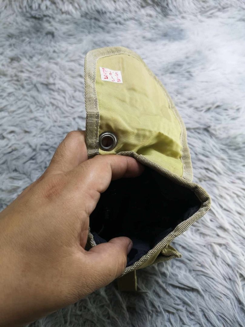 Quick release Buckle Closure Tactical Pouch (Category: Belt bags, Clutches and Pouches) located in Santa Cruz. Submitted by jmy_surplus.2 (Listing ID 1465881615, Image 2). Description: Size ; L - 7 W - 6 Color ; Khaki Type ; Pouch Brand ; No brand Material ; Nylon Style ; Tactical Utility Pouch LR 129 JMY 5 Batch #224.