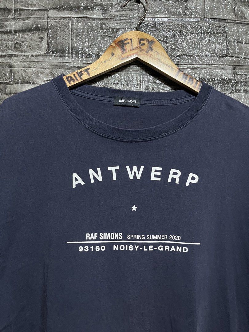 Raf Simons Antwerp Tour Shirt (Category: Tshirts & Polo Shirts ) located in Manila. Submitted by flex_curation (Listing ID 1465934330, Image 2). Description: 23x29 HAVE MINOR FLAW IN BACK PRINT OVERALL IN VERY GOOD CONDITION BACOOR CAVITE LOC.