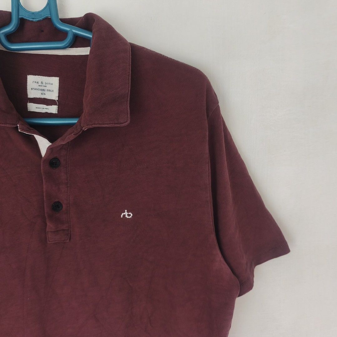 Rag & Bone standard issue slubbed cotton polo shirt (Category: Luxury Apparel) located in Tayabas. Submitted by cat.b0i (Listing ID 1465868399, Image 3). Description: Size on tag: M Fitting: Men - L Women - L ‎Length: 26 ‎Width: 19.5 ‎Shoulder: 16.5 ‎Arm Space: 9 ‎Sleeve Length: 8 ‎ ‎Color: Maroon Color Rate: 8.5 ‎Material: 100% cotton properties: ‎Issues: minor stains and minor general color fade ‎Condition: excellent.