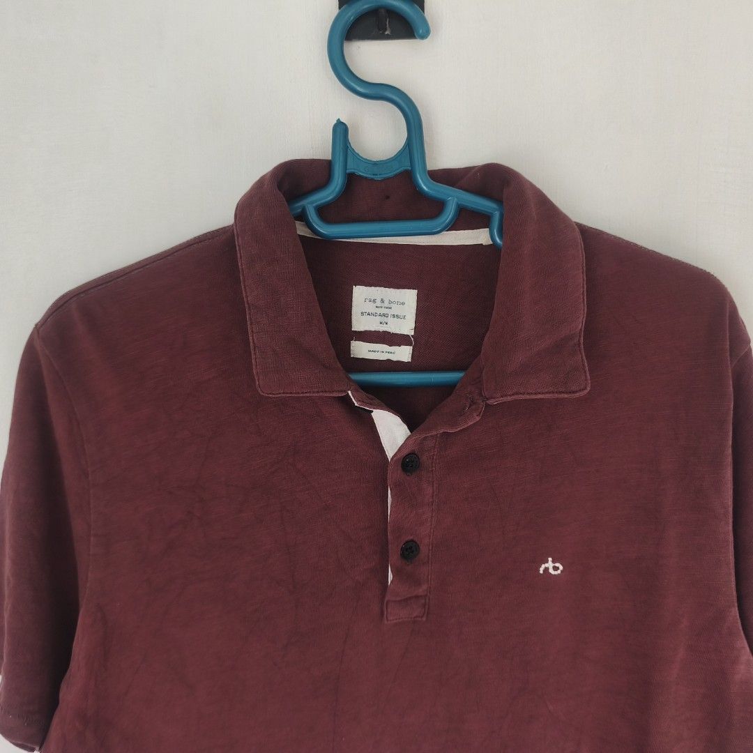 Rag & Bone standard issue slubbed cotton polo shirt (Category: Luxury Apparel) located in Tayabas. Submitted by cat.b0i (Listing ID 1465868399, Image 2). Description: Size on tag: M Fitting: Men - L Women - L ‎Length: 26 ‎Width: 19.5 ‎Shoulder: 16.5 ‎Arm Space: 9 ‎Sleeve Length: 8 ‎ ‎Color: Maroon Color Rate: 8.5 ‎Material: 100% cotton properties: ‎Issues: minor stains and minor general color fade ‎Condition: excellent.