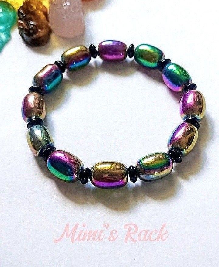 RAINBOW AURA LIULI BARREL BRACELET (Category: Bracelets) located in Taguig. Submitted by mimisrack (Listing ID 1465769536, Image 2). Description: 🌈 Iridescent glow bracelet radiating positivity and vibrant energy -Rainbow Aura Liuli reflects light beautifully with a multi-color sheen -Promotes joy, positivity, and uplifting energy -Aura finish symbolizes transformation and higher vibration -Barrel bead design represents stability and smooth life