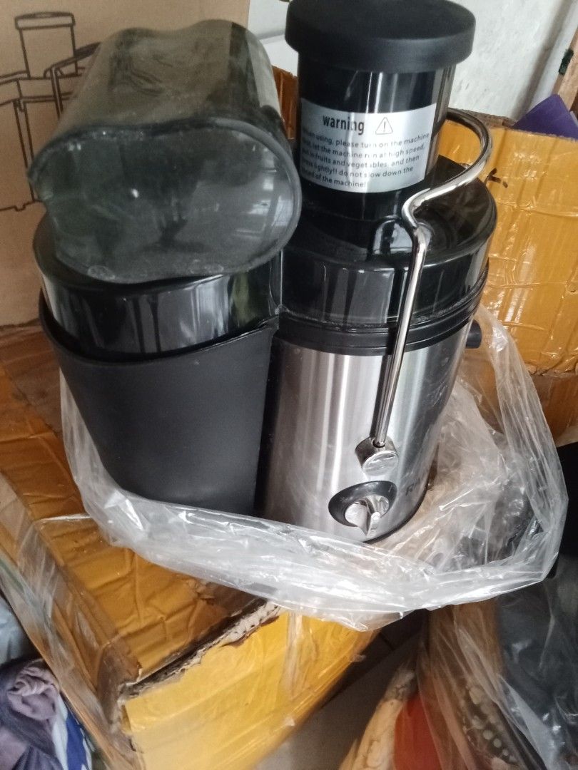 Rainbow Philippines Juicer Machine (Category: Juicers, Blenders & Grinders) located in Santa Rosa. Submitted by Sofia_Paprika (Listing ID 1465874393, Image 2). Description: - 304 stainless steel -64 mm silver - Equipped with a juice collector container and safety locking arm - Clear feeding chute with the original warning sticker still intact - Easy-to-use dial control at the base for speed settings.