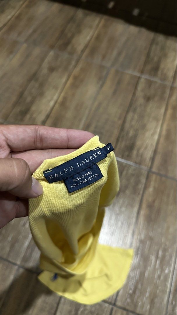 RALPH LAUREN YELLOW SLEEVELESS (Category: Shirts) located in Manila. Submitted by urban.vintage (Listing ID 1465793231, Image 2). Description: ISSUE: NONE (NEED WASH) MOP :GCASH (NO COD) SHIP VIA: LALAMOVE & J&T LOCATION: PASIG CITY LENGTH: 29 WIDTH :20 .