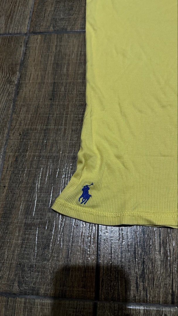 RALPH LAUREN YELLOW SLEEVELESS (Category: Shirts) located in Manila. Submitted by urban.vintage (Listing ID 1465793231, Image 3). Description: ISSUE: NONE (NEED WASH) MOP :GCASH (NO COD) SHIP VIA: LALAMOVE & J&T LOCATION: PASIG CITY LENGTH: 29 WIDTH :20 .