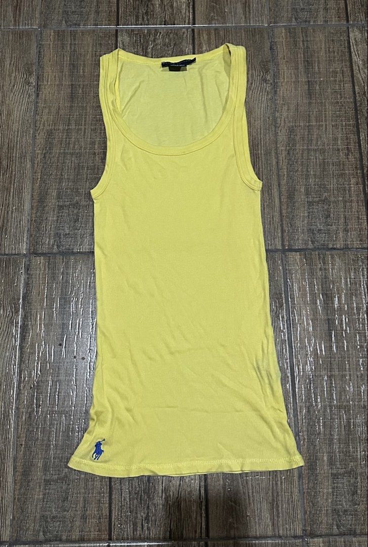 RALPH LAUREN YELLOW SLEEVELESS (Category: Shirts) located in Manila. Submitted by urban.vintage (Listing ID 1465793231, Image 1). Description: ISSUE: NONE (NEED WASH) MOP :GCASH (NO COD) SHIP VIA: LALAMOVE & J&T LOCATION: PASIG CITY LENGTH: 29 WIDTH :20 .