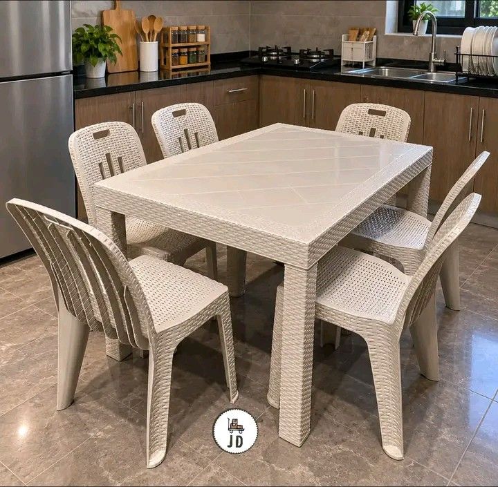 Rattan Style Dining Table Set with 6 Chairs (Category: Tables & Sets) located in Manila. Submitted by berdenmarl01688 (Listing ID 1465819746, Image 1). Description: - Complete dining set: 1 rectangular table and 6 matching chairs - Stylish woven rattan tabletop with an easy-to-clean surface - Chairs feature a classic vertical slat back design - Solid legs ensure stable support for everyday family meals - Versatile neutral tone that easily matches