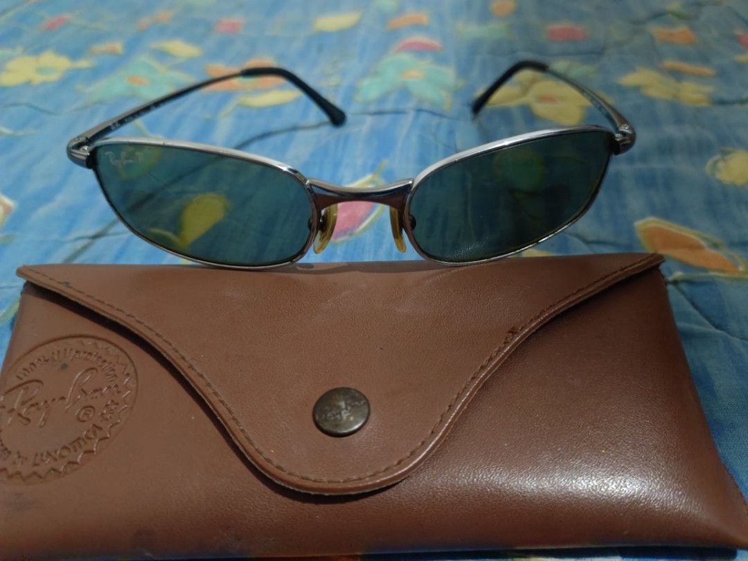 Rayban Sunglasses (Category: Activewear) located in Manila. Submitted by aumberhale04.41 (Listing ID 1465834275, Image 2). Description: RB3162 like new with its original case check details.