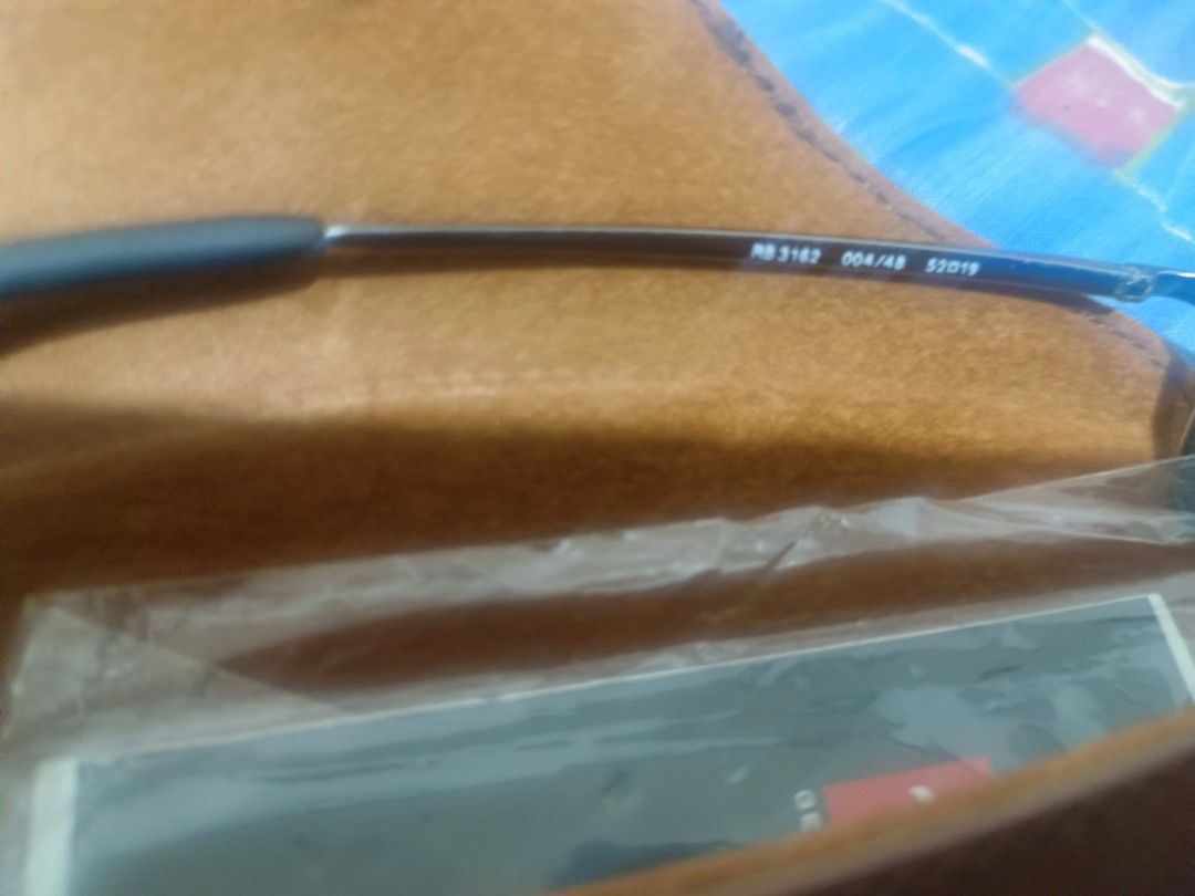 Rayban Sunglasses (Category: Activewear) located in Manila. Submitted by aumberhale04.41 (Listing ID 1465834275, Image 3). Description: RB3162 like new with its original case check details.