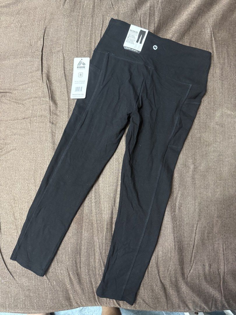 RBX Black Capri Length Leggings with Side Pockets (Category: Activewear) located in Quezon City. Submitted by mt031199 (Listing ID 1465946819, Image 1). Description: - Brand: RBX Activewear - Style: Capri length leggings with high-waisted fit - Size: Small (S) - Color: Classic Black - Features: Convenient side pockets for phone storage, excellent stretch, and solid, squat-proof fabric - Condition: Brand new with original tags attached (retail pri