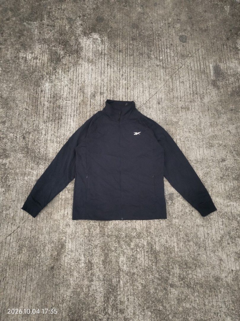 Rebook Track Jacket (Category: Coats, Jackets and Outerwear) located in Caloocan City. Submitted by haruconcep52476 (Listing ID 1465137517, Image 1). Description: Dimensions W21×L26.5 Good condition Color rate 10 No issue Fresh from bale.