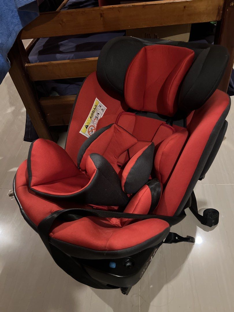 Red and Black Child Car Seat (Category: Car Seats) located in Mambajao. Submitted by milys.closetish (Listing ID 1465759732, Image 1). Description: - Color: Stylish Red and Black - Safety First: Built-in harness straps and side impact protection wings - Comfort: Padded head support for extra coziness during rides - Adjustable: Features base adjustments for a secure fit - Easy to Clean: Removable fabric covers that are washable - Condition: Fully 