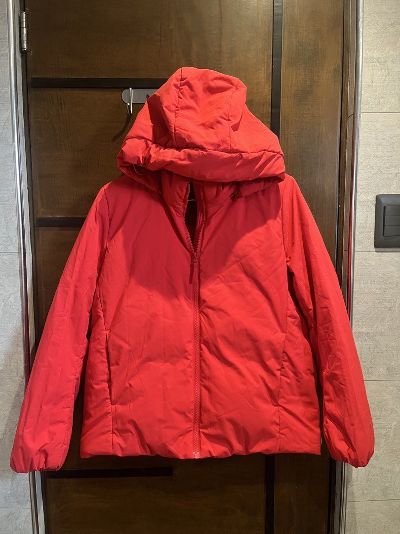 Red Puffer Jacket with Removable Hood (Category: Coats, Jackets and Outerwear) located in Las Pinas. Submitted by francesaly (Listing ID 1465923183, Image 3). Description: - Bright red winter jacket with warm insulated padding - Convenient full zip front closure - Removable zip-off hood for two different looks - Deep side pockets for warming hands and storage - Adjustable drawstrings on the hood for a custom fit - Great layering piece for cold we