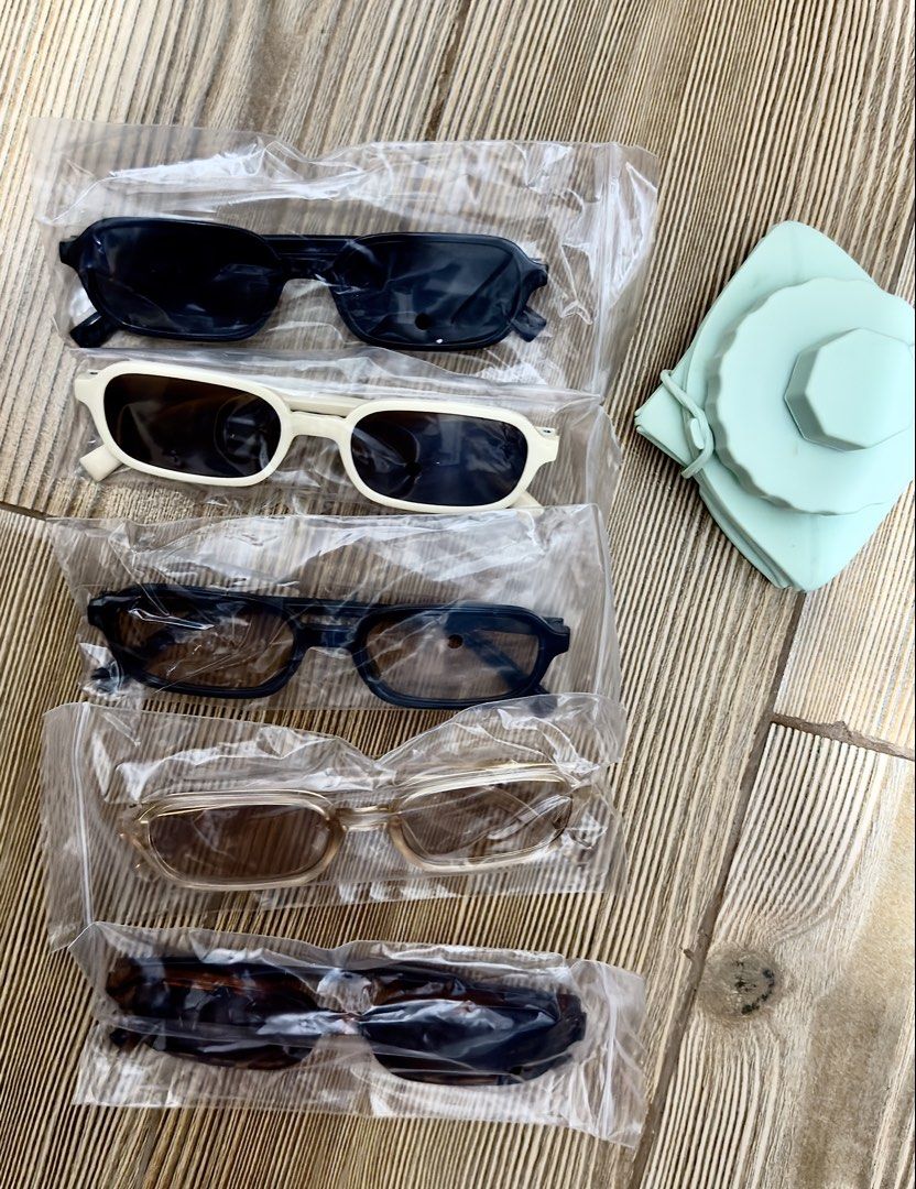 Retro Rectangular Sunglasses Bundle Various Colors (Category: Sunglasses & Eyewear) located in San Juan City. Submitted by pewchipie (Listing ID 1465892245, Image 1). Description: - Quantity: 5 pairs of rectangular sunglasses - Colors & Patterns: Solid black, cream frame with dark lenses, dark grey, translucent beige, and tortoiseshell - Style: Thick frames, vintage Y2K aesthetic - Condition: Brand new, unopened in original bags, never worn - Per