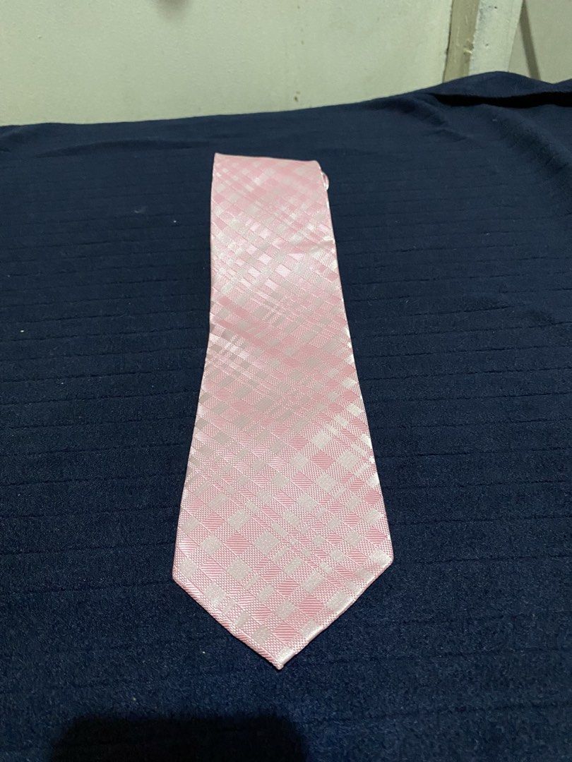 Roberno Classic Mode Pink Checkered Microfiber Tie (Category: Ties) located in Manila. Submitted by resi.diaz (Listing ID 1465895058, Image 1). Description: - Brand: Roberno Classic Mode - Design: Pink checkered with a nice woven texture - Material: 100% microfiber - Size: Standard width - Condition: Clean tags attached inside - Ideal for: Formal wear, weddings, and office fits.