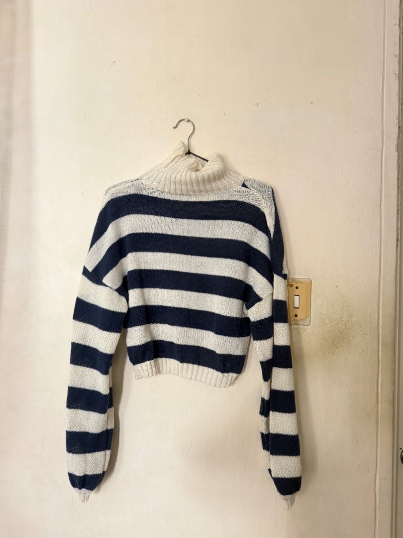 ROMWE Blue and White Striped Turtleneck Sweater (Category: Longsleeves) located in Carmona. Submitted by beaburrito (Listing ID 1465761907, Image 3). Description: - Brand: ROMWE - Design: Blue and white stripes with chic turtleneck - Sleeves: Long lantern sleeves with ribbed cuffs and hem - Material: Cozy, soft knit - Condition: Worn a few times, still in great shape and freshly cleaned - Styling: Easy to pair with high-waisted jeans or skirts.