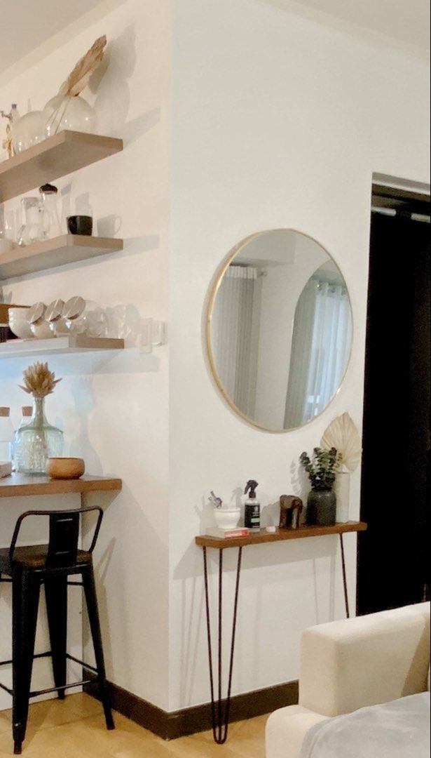 Round Wall Mirror with Gold Metal Frame (Category: Mirrors) located in Taguig. Submitted by boxedgoodies (Listing ID 1465877101, Image 3). Description: - Elegant round wall mirror with a thin gold-toned metal frame - Flawless glass with zero scratches, cracks, or defects - Perfect size to open up small spaces and bounce natural light around - Secure hanging hardware already mounted at the back - Ideal for living rooms, entryways, or bedrooms - Se