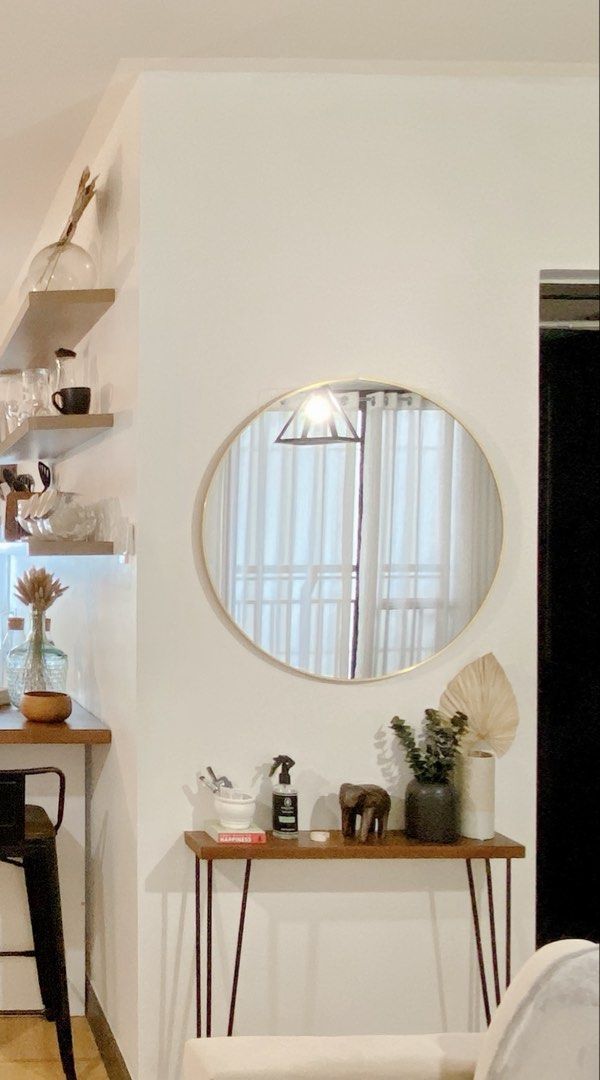 Round Wall Mirror with Gold Metal Frame (Category: Mirrors) located in Taguig. Submitted by boxedgoodies (Listing ID 1465877101, Image 1). Description: - Elegant round wall mirror with a thin gold-toned metal frame - Flawless glass with zero scratches, cracks, or defects - Perfect size to open up small spaces and bounce natural light around - Secure hanging hardware already mounted at the back - Ideal for living rooms, entryways, or bedrooms - Se