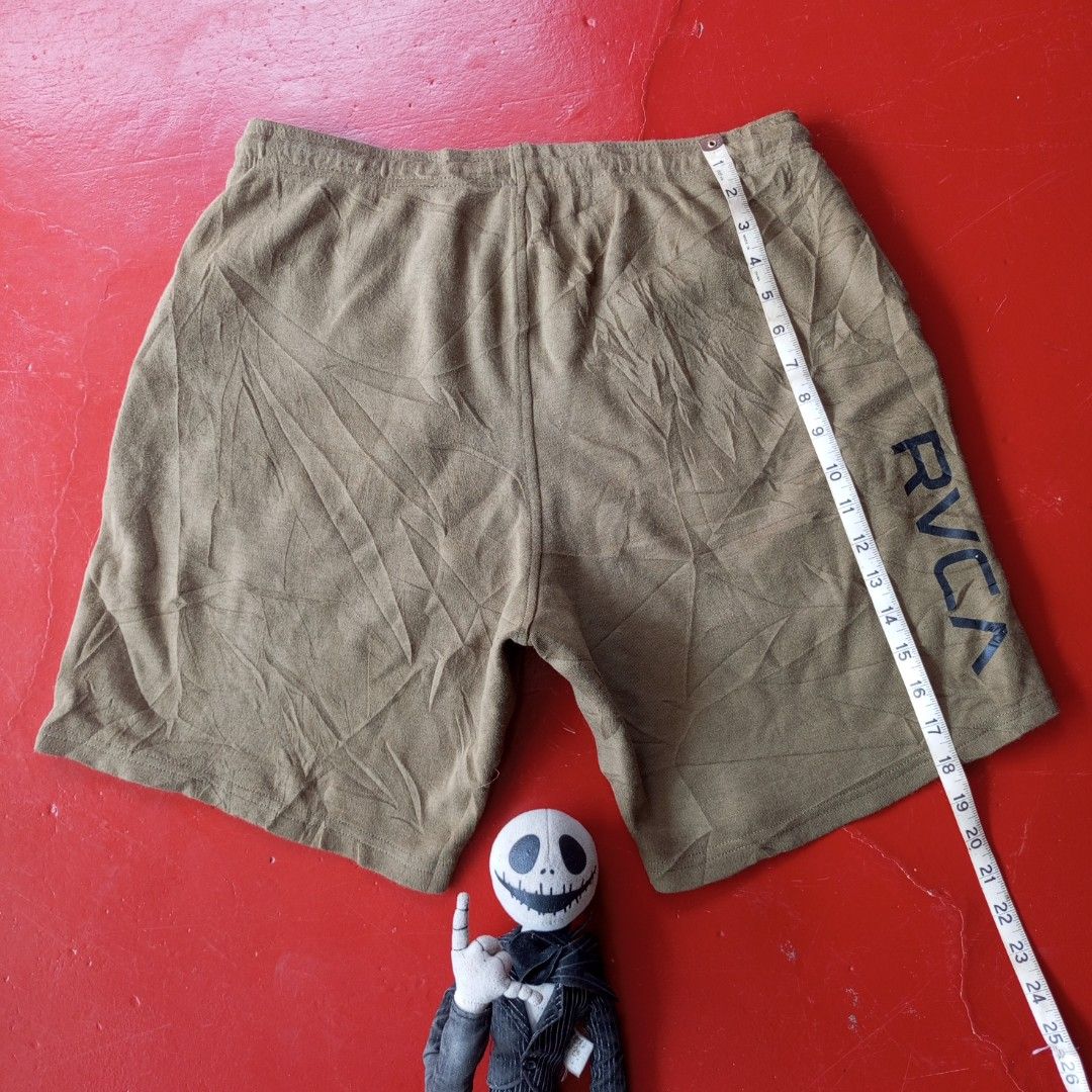 RVCA Olive Green Drawstring Shorts (Category: Activewear) located in Naga. Submitted by ErbsXBudolstuff (Listing ID 1465799390, Image 3). Description: Dm PHP 780 olive green RVCA Sport IV Performance Shorts, highlighted by the distinctive "VA" logo printed near the hem on the left leg and an adjustable drawcord waistband. Large 30 to 34 fit Length 19 inc Excellent Condition No issue.