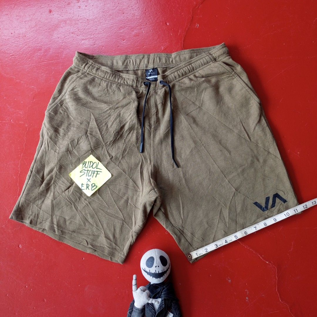 RVCA Olive Green Drawstring Shorts (Category: Activewear) located in Naga. Submitted by ErbsXBudolstuff (Listing ID 1465799390, Image 2). Description: Dm PHP 780 olive green RVCA Sport IV Performance Shorts, highlighted by the distinctive "VA" logo printed near the hem on the left leg and an adjustable drawcord waistband. Large 30 to 34 fit Length 19 inc Excellent Condition No issue.