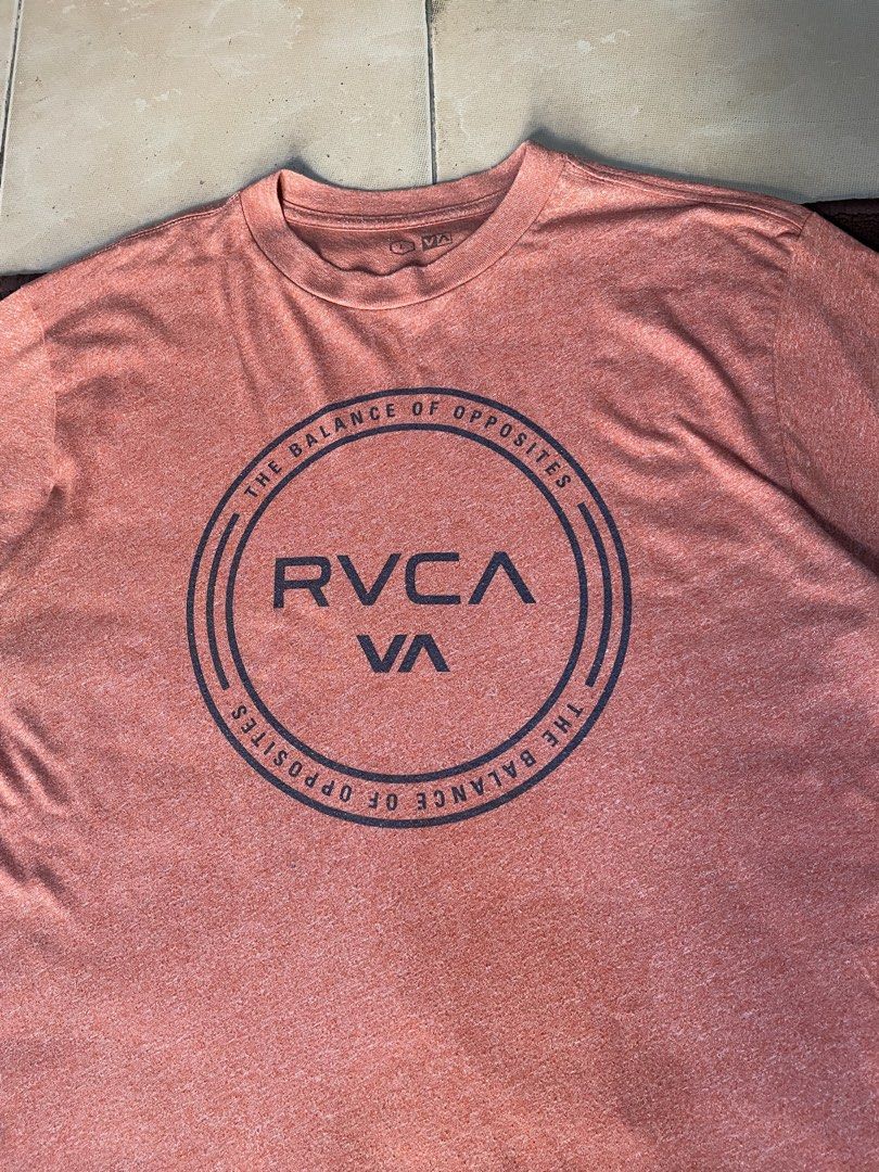 RVCA TSHIRT (Category: Tshirts & Polo Shirts ) located in Batangas. Submitted by streetheadph (Listing ID 1465774204, Image 2). Description: RVCA TSHIRT SIZE ON TAG : LARGE DIMES: W 21 / L 28 CONDITION: EXCELLENT COLOR: ORANGE COLORRATE: 9.2 / 10 ISSUE: NEED WASH PRICE: 350+ SHIPPING FEE NEED WASH THIS ITEM IS UKAY PLEASE MANAGE YOUR EXPECTATION ALWAYS READ THE DETAILS.